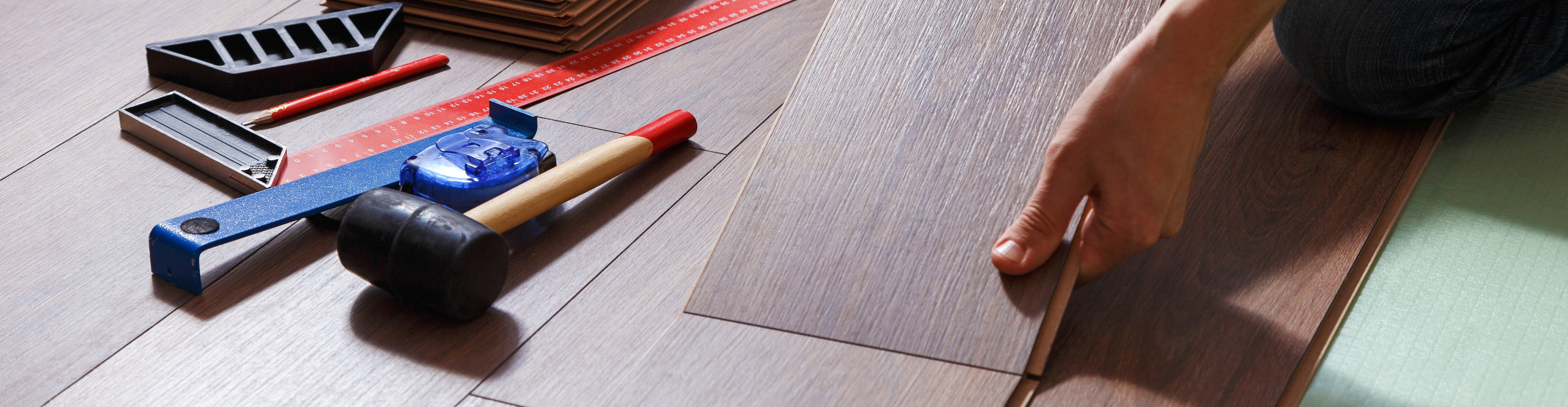 installation of wood flooring with tools